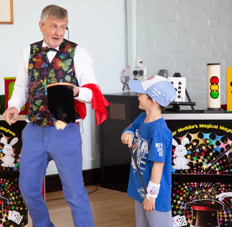Children's entertainer performing on stage