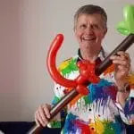Professional children's magician making a balloon creation