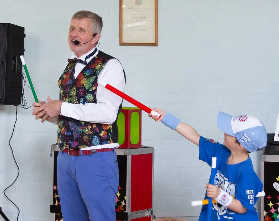 Professional magician performing balloon twisting