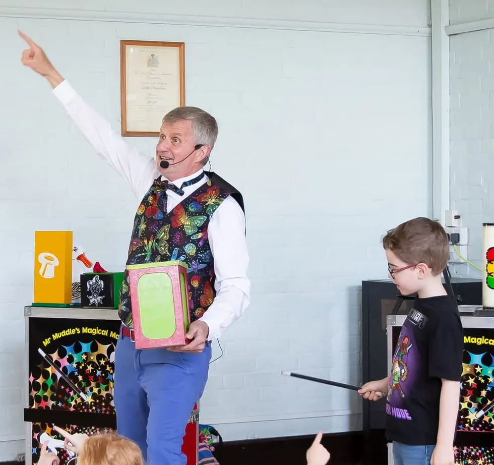 Children's entertainer performing balloon modelling