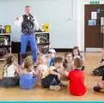 Kids' party entertainer with colourful stage props